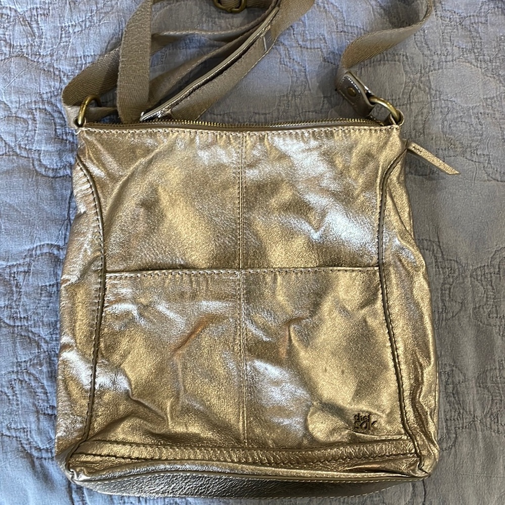The Sak gold crossbody purse